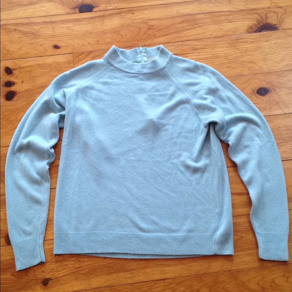Pastel blue back-zippered sweater